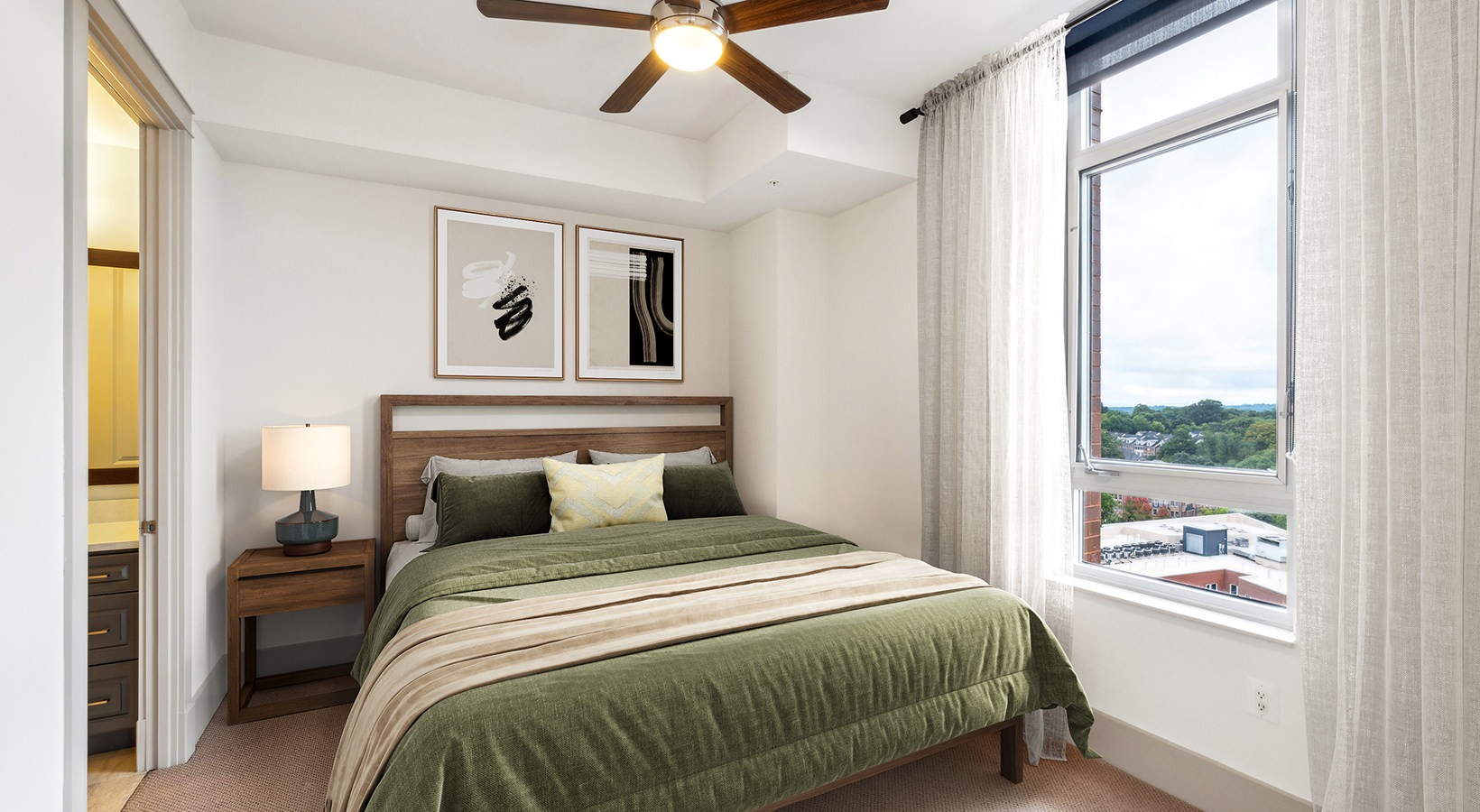 bedroom with bed and large window