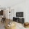 living room with a coffee table and tv