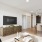 living room with coffee table and TV